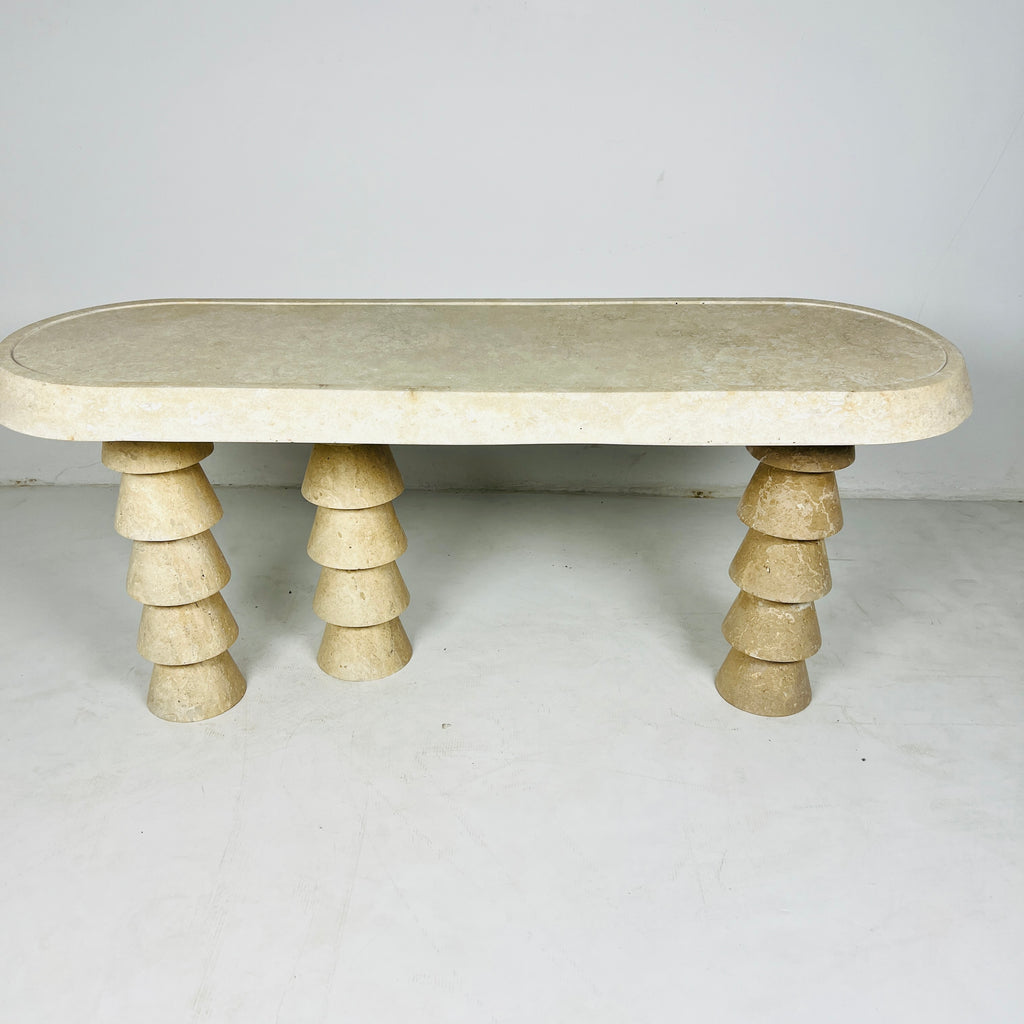 Three- Legged Travertine Table