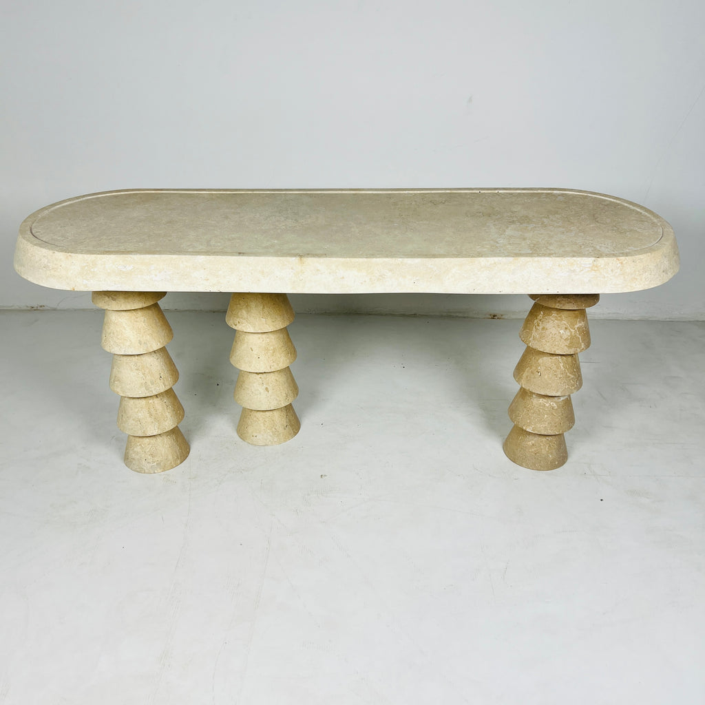 Three- Legged Travertine Table