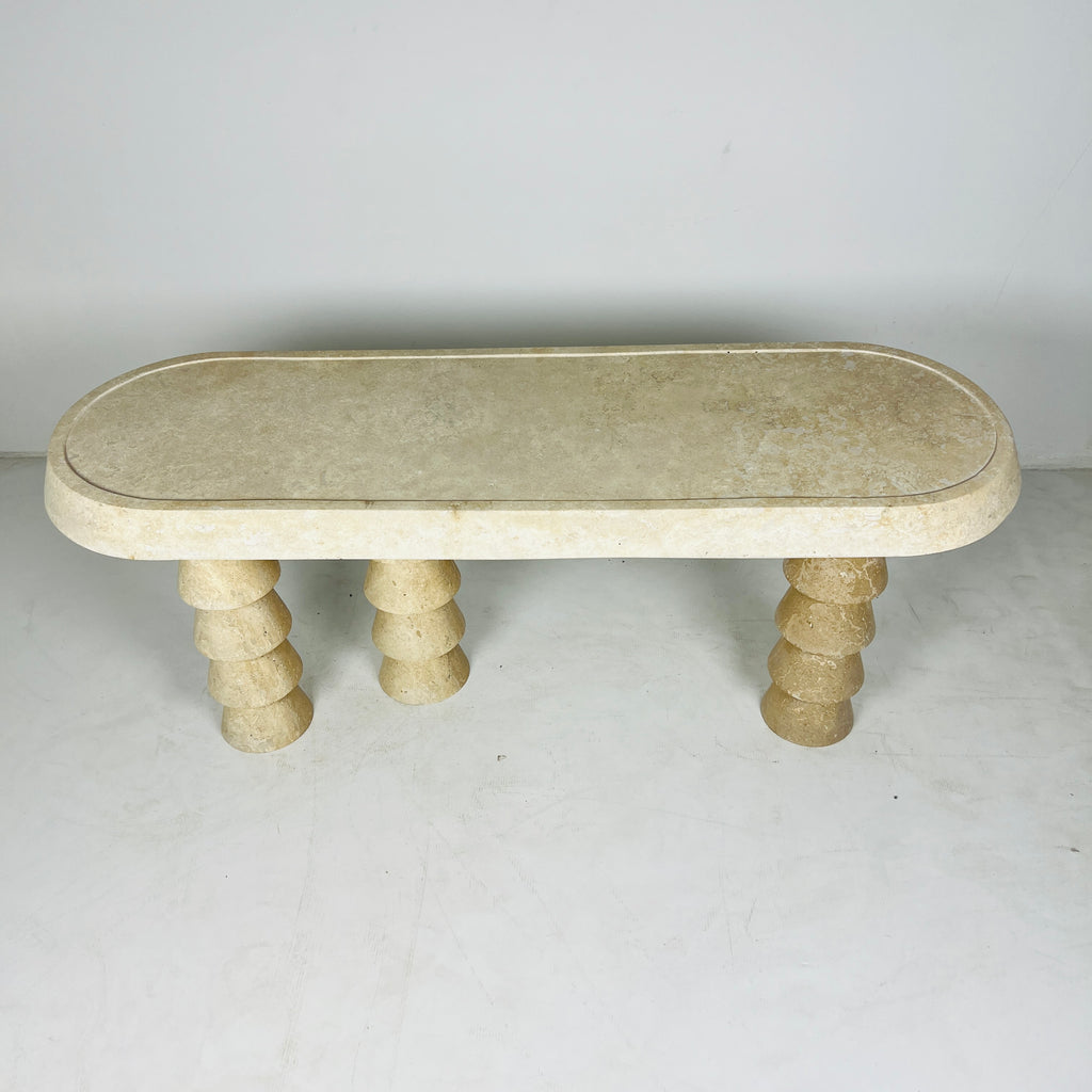 Three- Legged Travertine Table