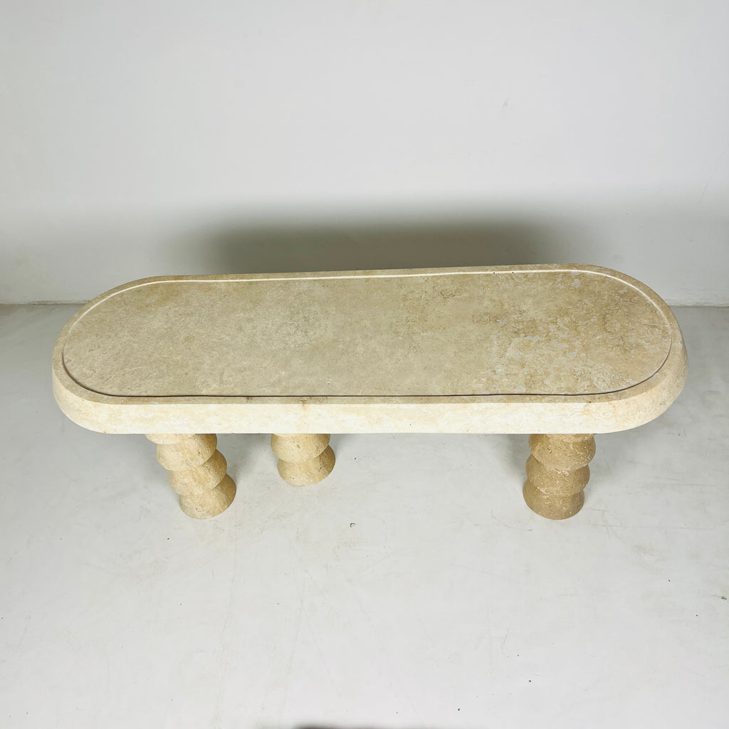 Three- Legged Travertine Table