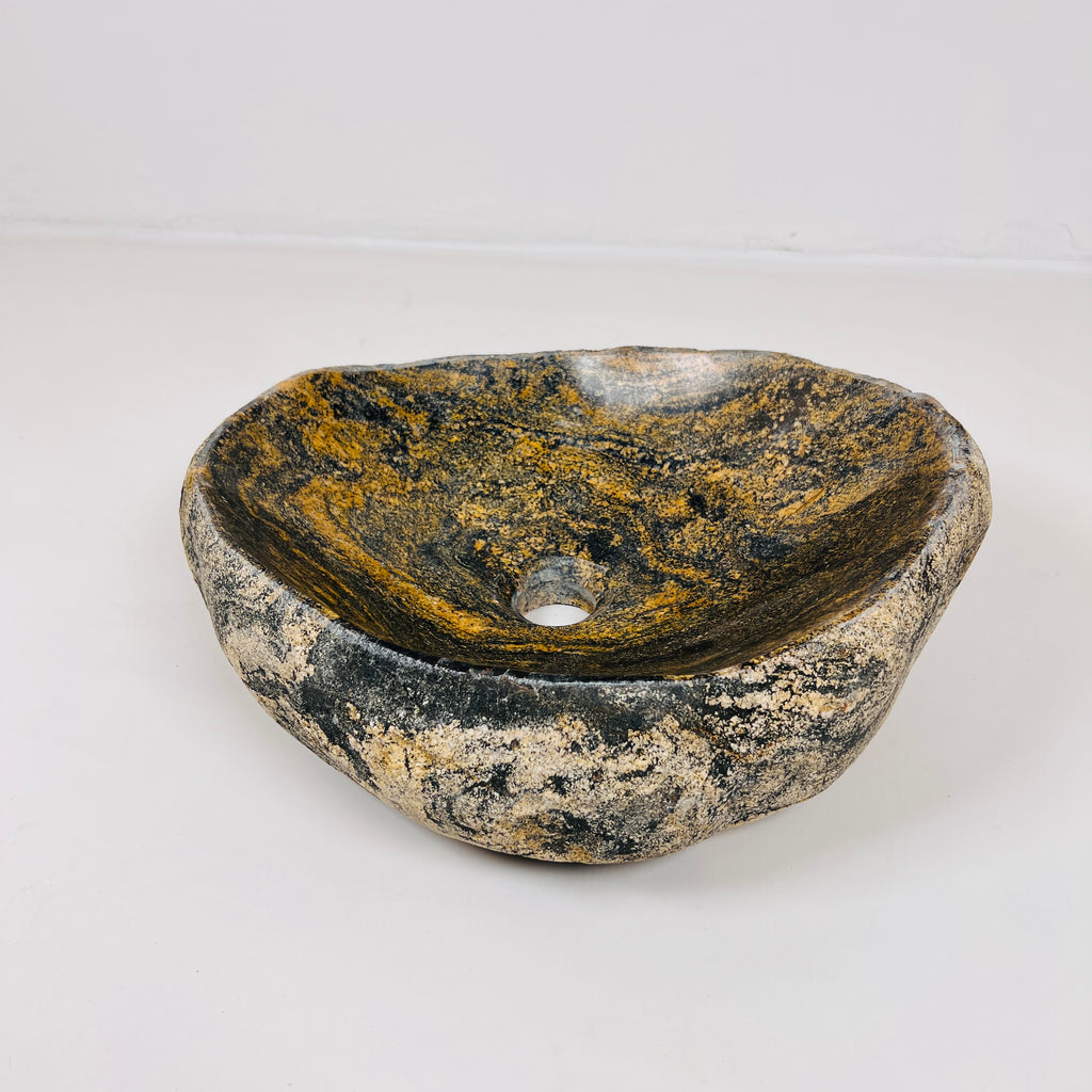 Mustard Splashed Stone Sink