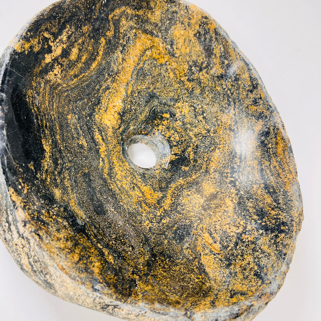 Mustard Splashed Stone Sink