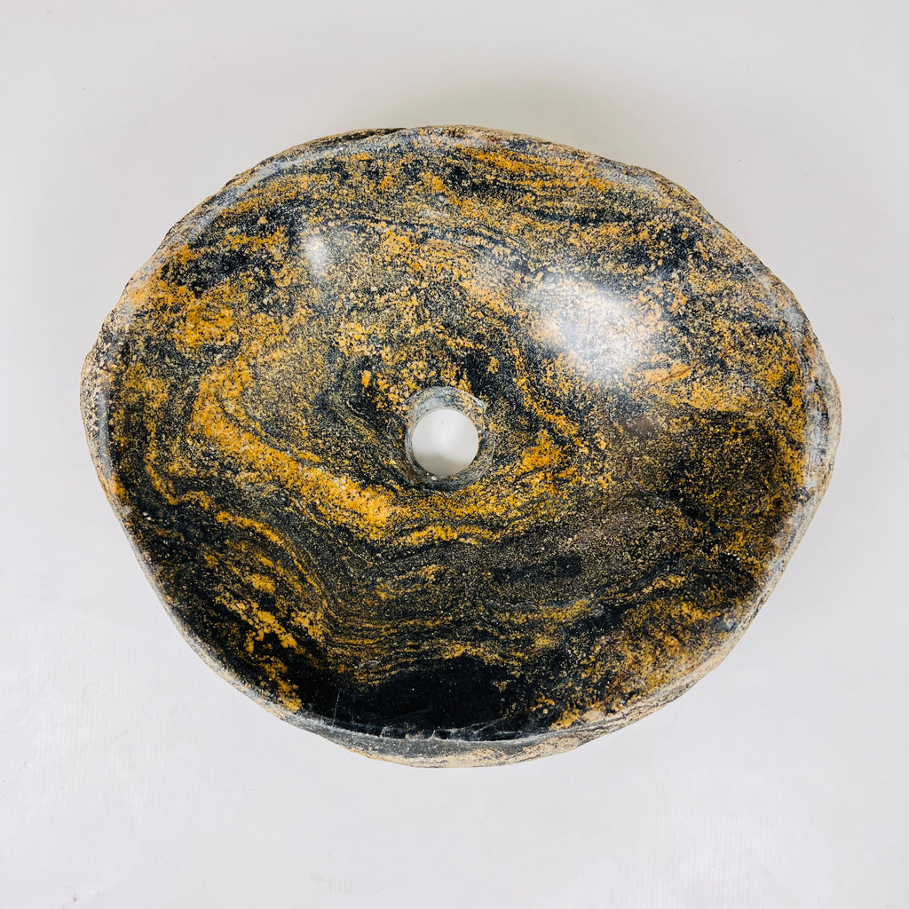 Mustard Splashed Stone Sink